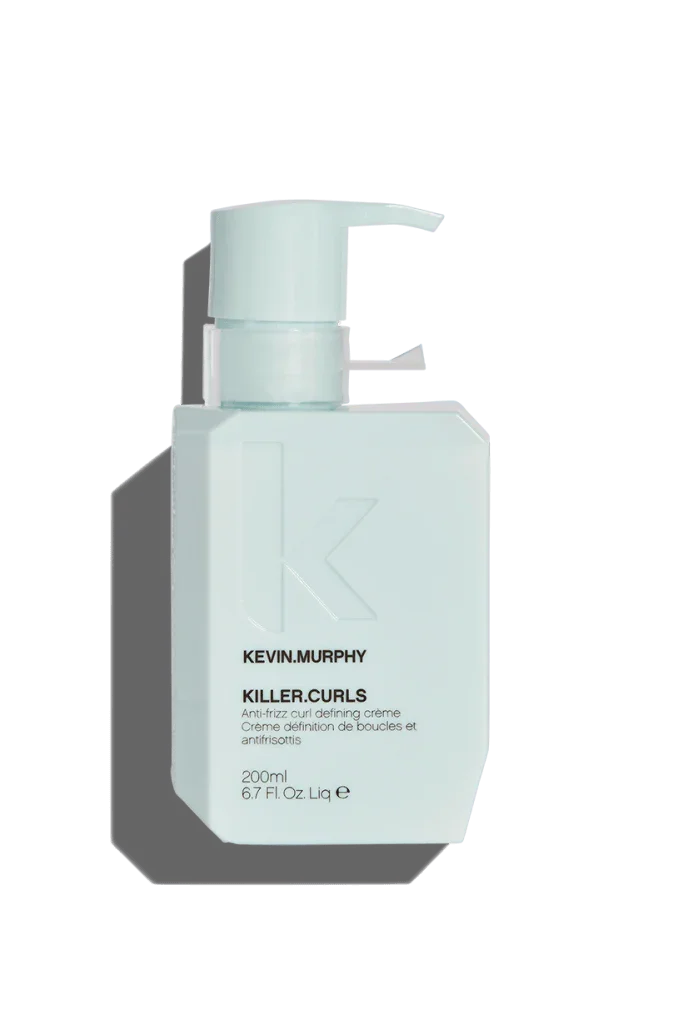 A white pump bottle with the label 'KEVIN.MURPHY KILLER.CURLS' designed for hair care.