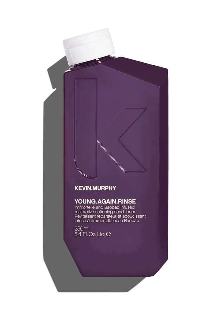 A purple bottle of Kevin Murphy YOUNG.AGAIN.RINSE Conditioner, 250 ml.