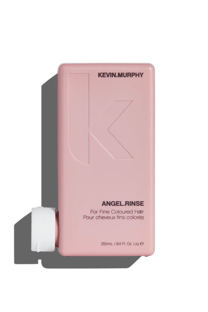 A pink bottle of Kevin Murphy Angel.Rinse Conditioner, 250 ml.