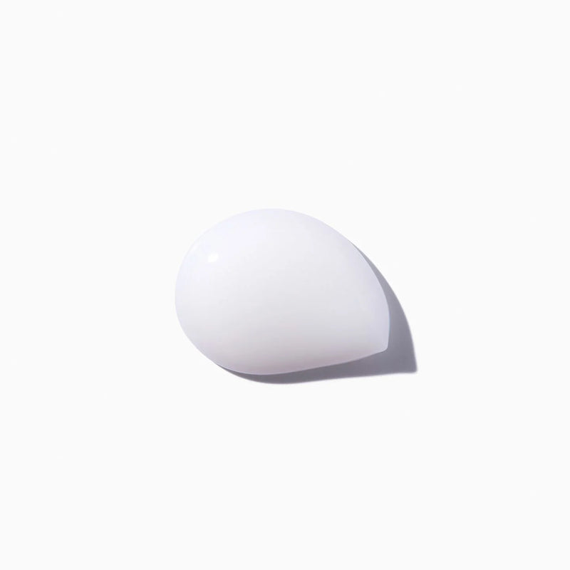 White teardrop-shaped object on a white background