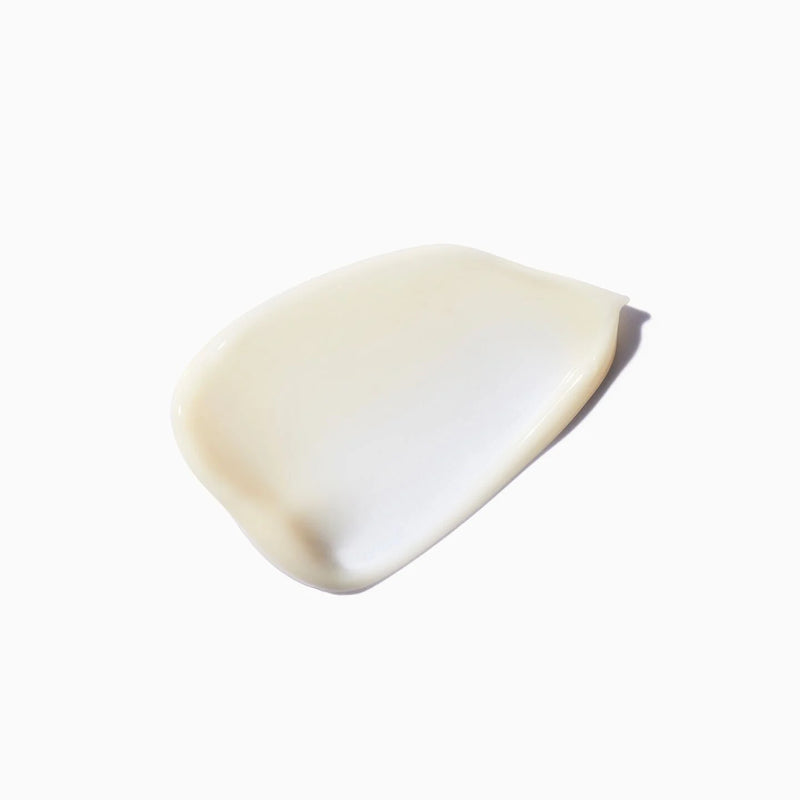 White ceramic teardrop-shaped object on a white background