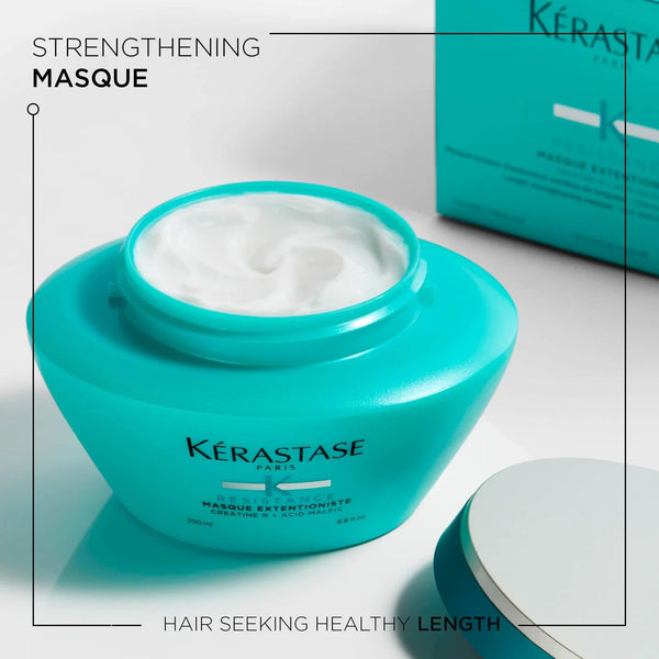 Kérastase Strengthening Masque jar with white cream on a light gray background