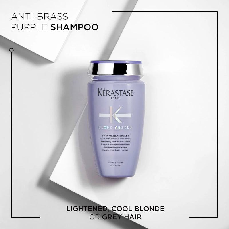 Kérastase anti-brass purple shampoo bottle on a white background