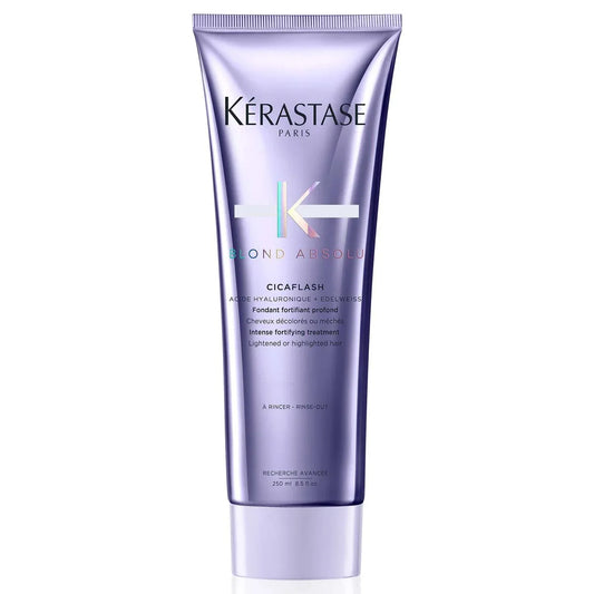 Bottle of Kerastase Cicaflash conditioner against white background