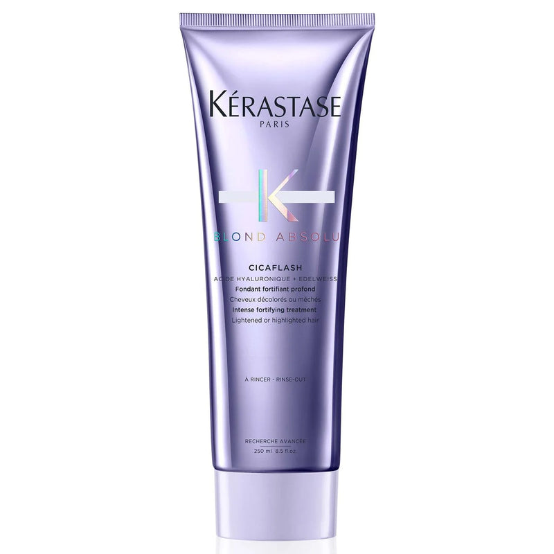 Bottle of Kerastase Cicaflash conditioner against white background