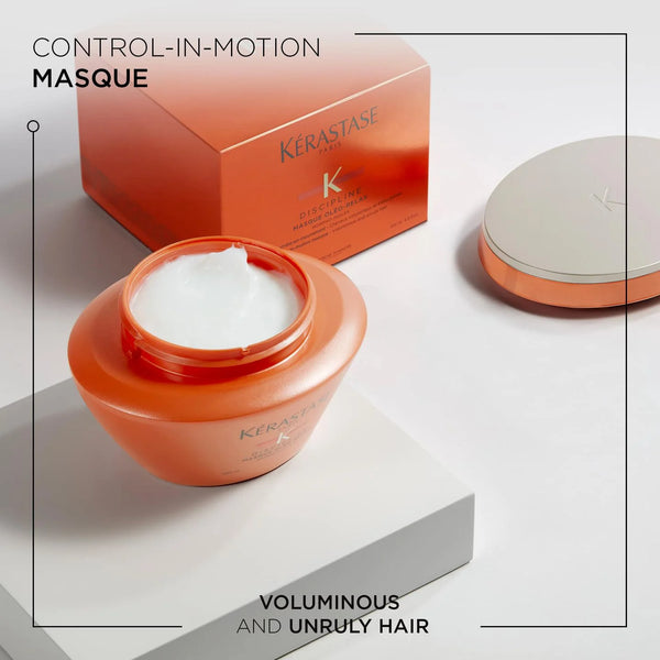 Kerastase Control-In-Motion Masque jar with packaging on a light background