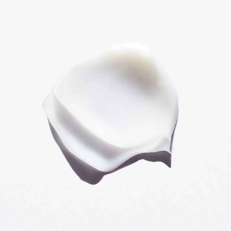 Close-up of a white ceramic bowl on a light gray background