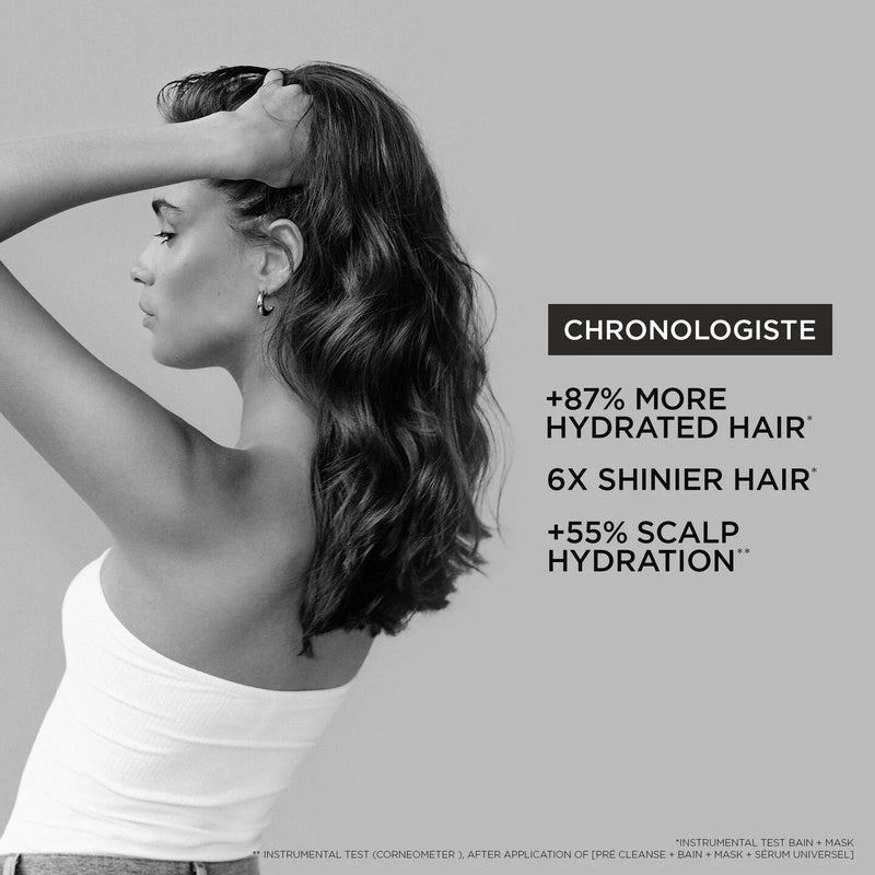 Woman with styled hair against a gray background, featuring Chronologiste product benefits.
