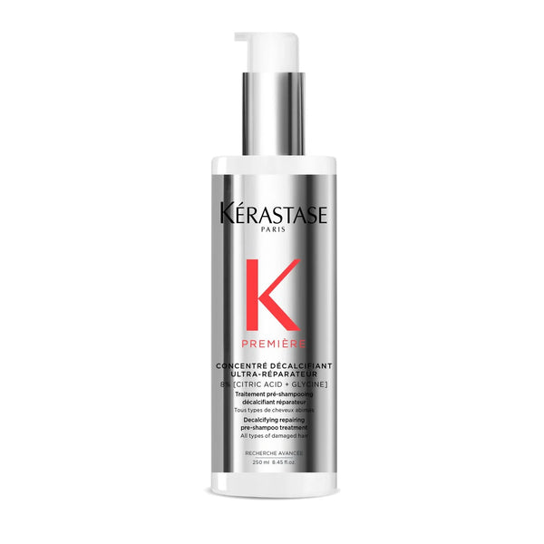Kérastase hair care product bottle on a white background