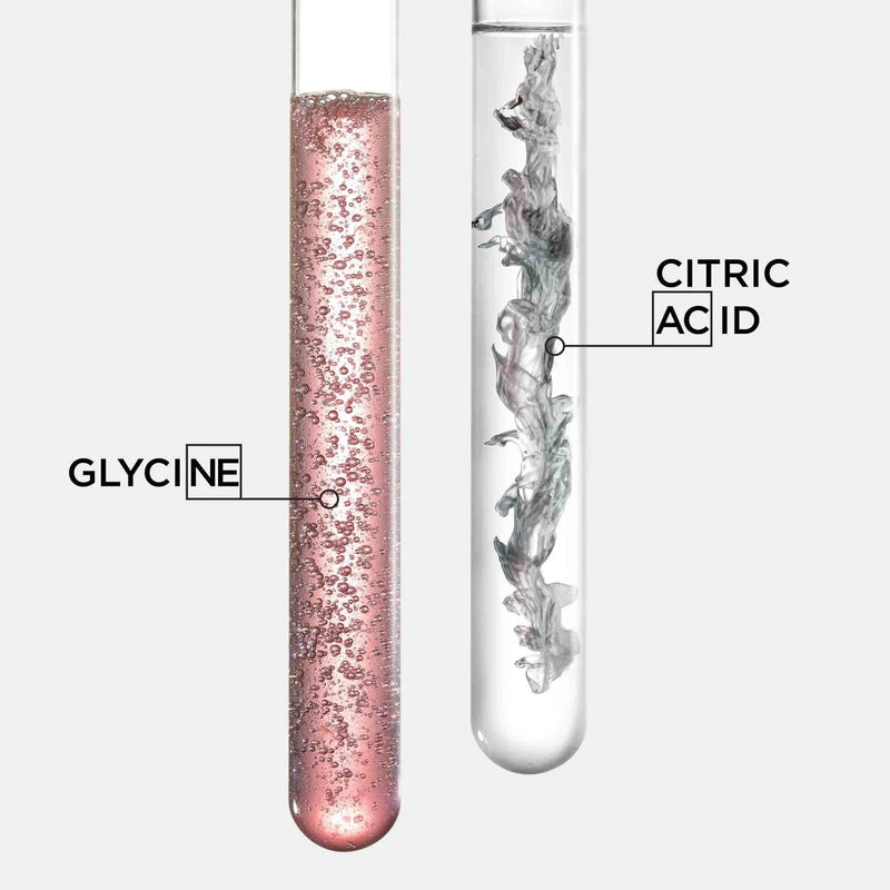 Two test tubes labeled 'Glycine' and 'Citric Acid' with visible chemical reactions.