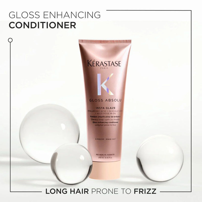 Kérastase Gloss Absolu conditioner bottle with water droplets on a light background