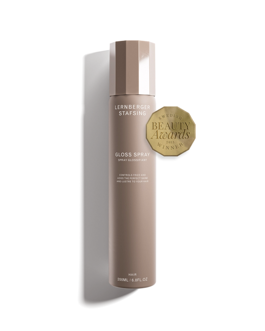 Lernberger Stafsing gloss spray bottle with a gold beauty awards badge on a white background