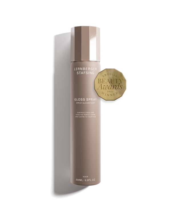 Lernberger Stafsing gloss spray bottle with a gold beauty awards badge on a white background