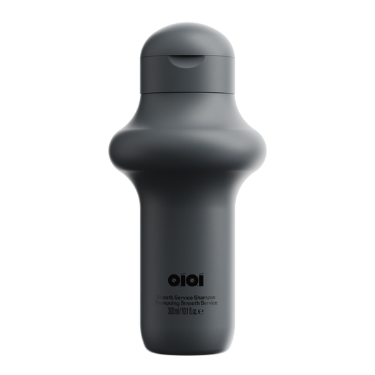 Dark gray bottle with 'QIOI' branding on a white background