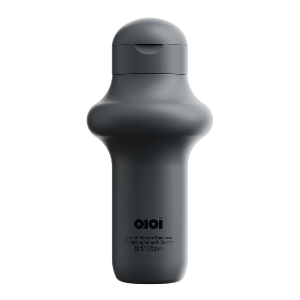 Dark gray bottle with 'QIOI' branding on a white background