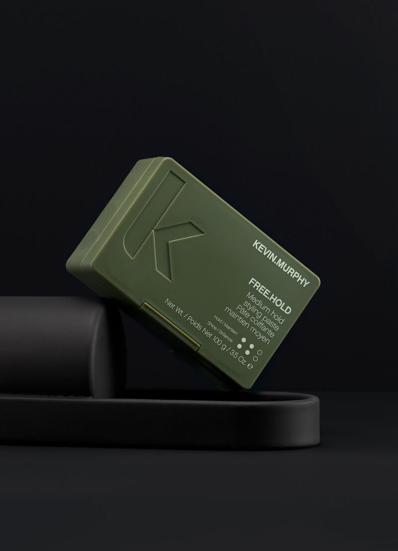 Kevin Murphy hair product bar on a black background