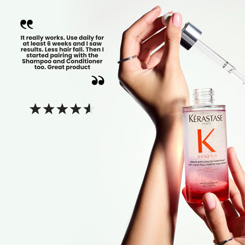 Kérastase hair serum bottle held by a hand with five-star rating text.