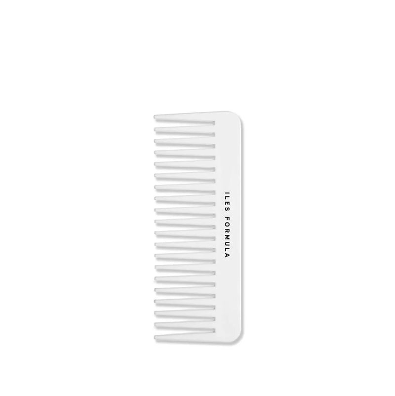 White comb with 'ILES FORMULA' branding on a white background