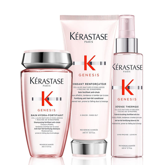 Kérastase hair care products including shampoo, conditioner, and serum on a white background