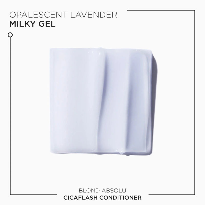 Texture of Kerastase Cicaflash conditioner with ad text on white background