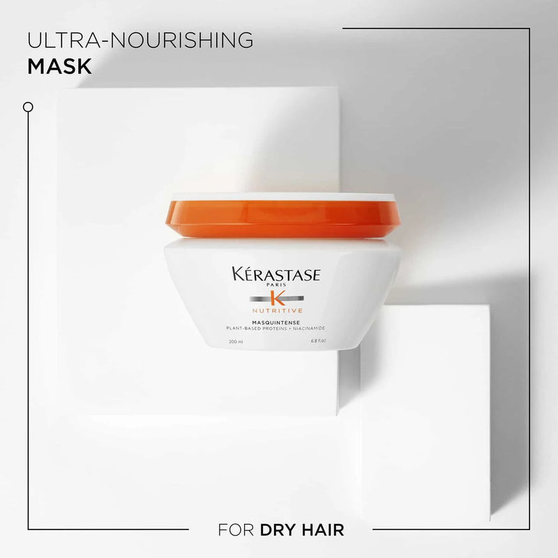 Kerastase ultra-nourishing mask jar with orange lid on a white background