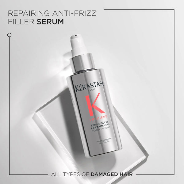 Kérastase serum bottle on a light gray background with text about repairing anti-frizz filler.