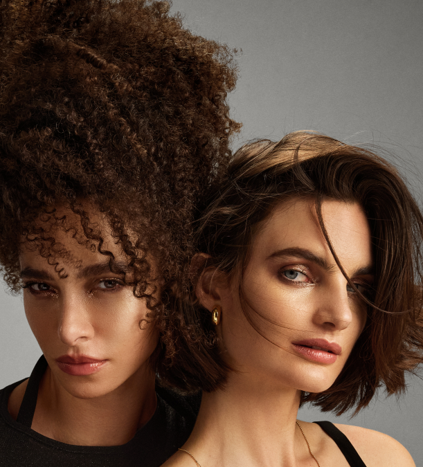 Two girls after using the Oribe Gold Lust Restorative Night Cream for hair