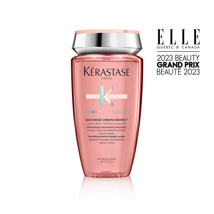 Kérastase shampoo bottle with ELLE 2023 Beauty Grand Prix award on a white background