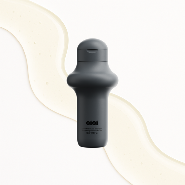 Dark gray water bottle with 'OIOI' branding on a light background