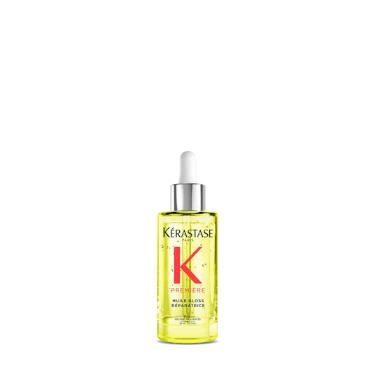 Kérastase hair care product bottle on a white background