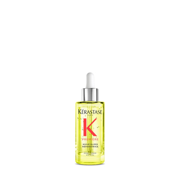 Kérastase hair care product bottle on a white background