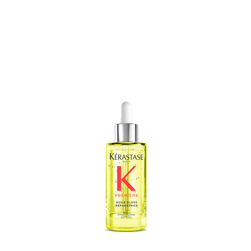 Kérastase hair care product bottle on a white background