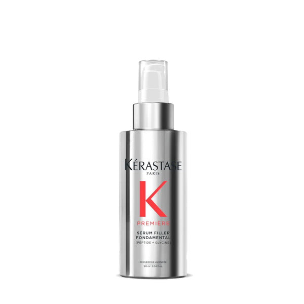 Kérastase hair care product bottle on a white background