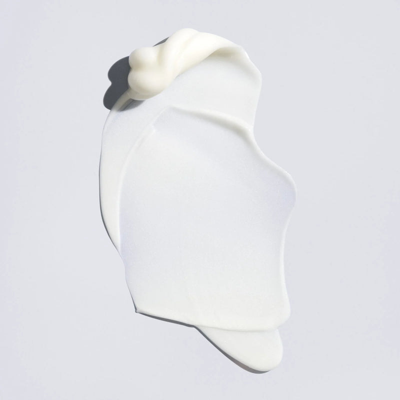 White silicone mold on a light gray background