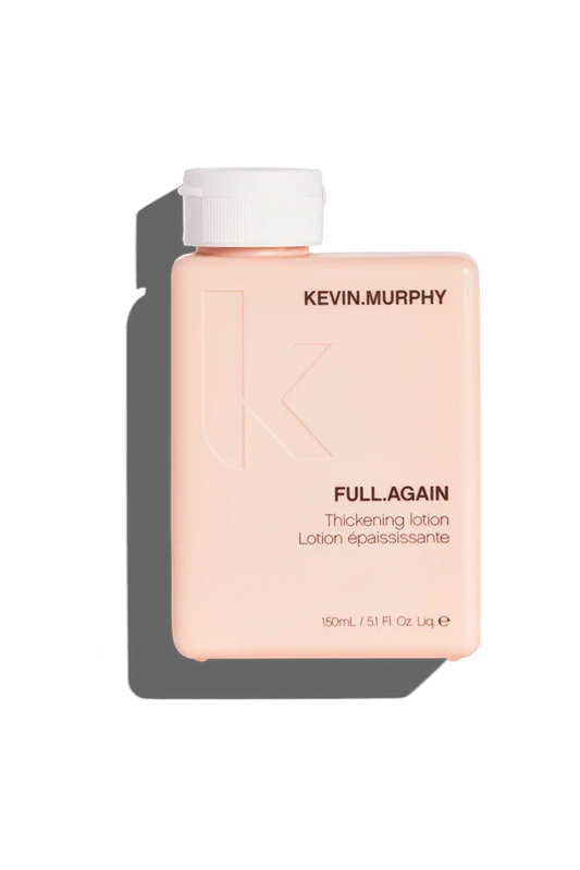 A bottle of Kevin Murphy Full.Again Thickening Lotion, with pink and white labeling, against a green background.