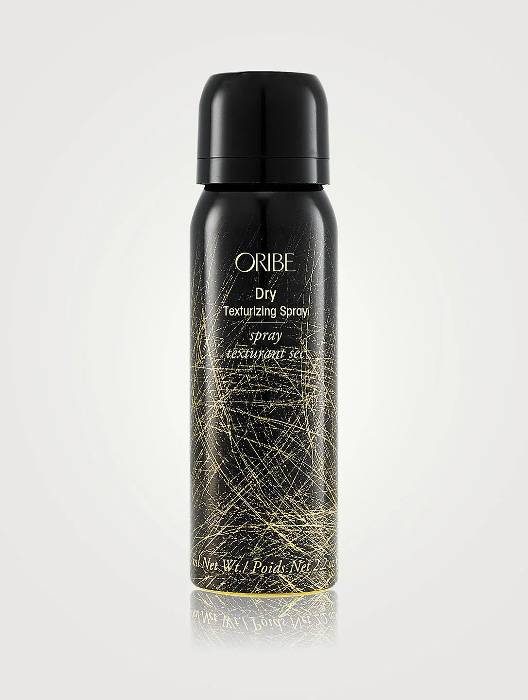 Bottle of ORIBE Dry Texturizing Spray Travel Size on white background
