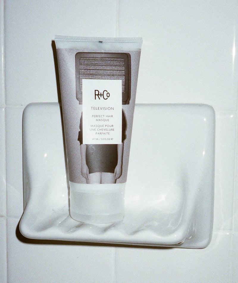 R+CO TELEVISION Perfect Hair Masque bathrom stand