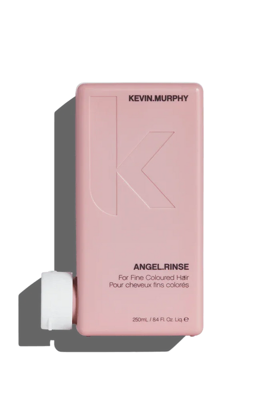 A pink bottle of Kevin Murphy Angel.Rinse Conditioner, 250 ml.