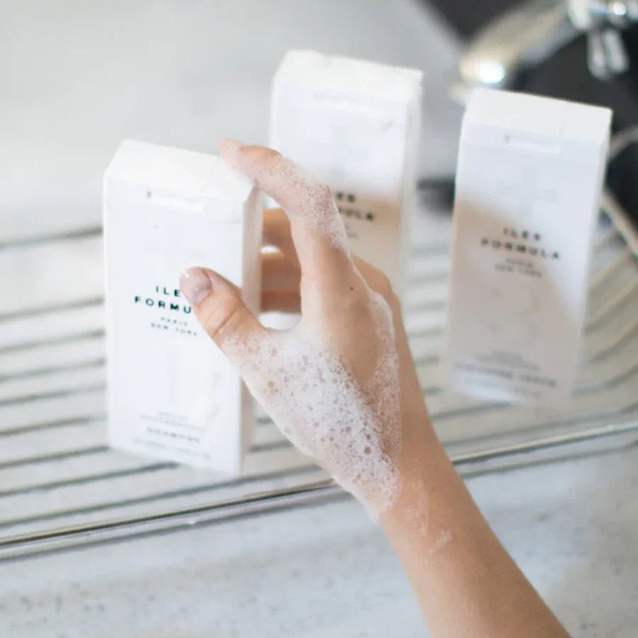 Iles Formula Signature Collection Bottles in bathroom