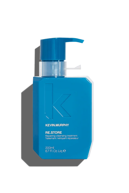 A blue bottle of Kevin Murphy Re.Store hair treatment with a pump dispenser.