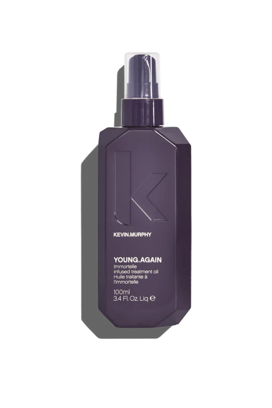 A spray bottle of Kevin Murphy Young.Again Oil, designed for damaged and ageing hair.